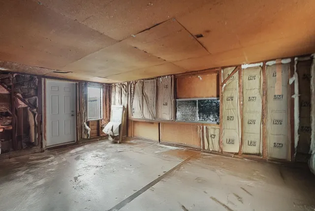 a view of a room with an entryway