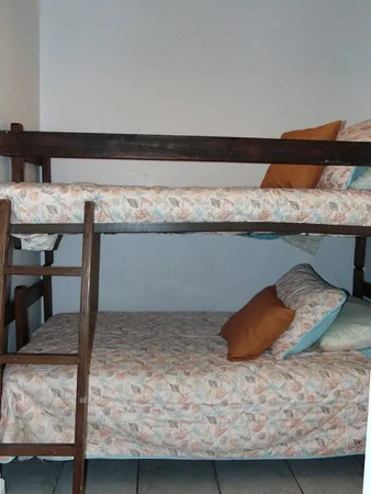 a bathroom with a toilet and a sink