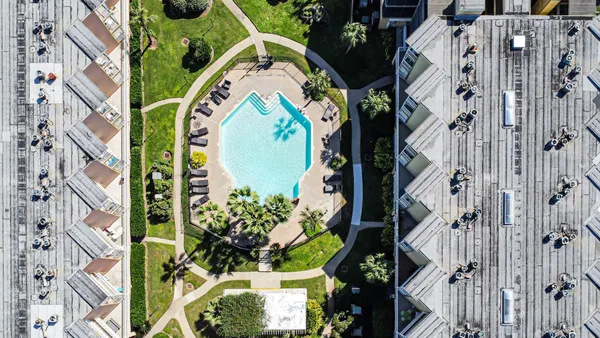 a bedroom with a bed and tv