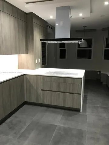 a large bathroom with a large mirror