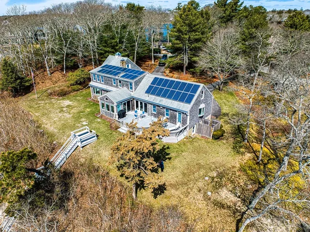 a view of a yard with swimming pool