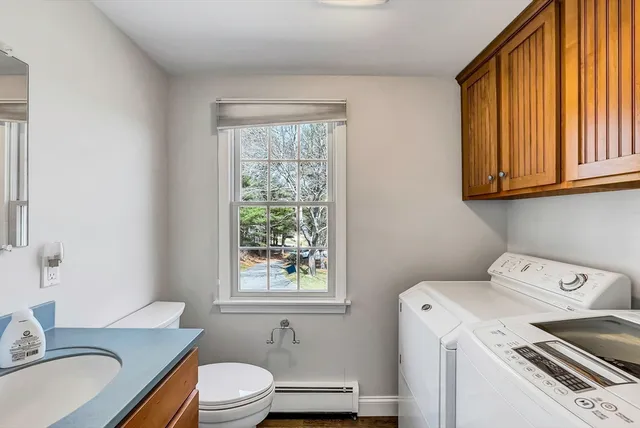 a spacious bedroom with a bed and a window