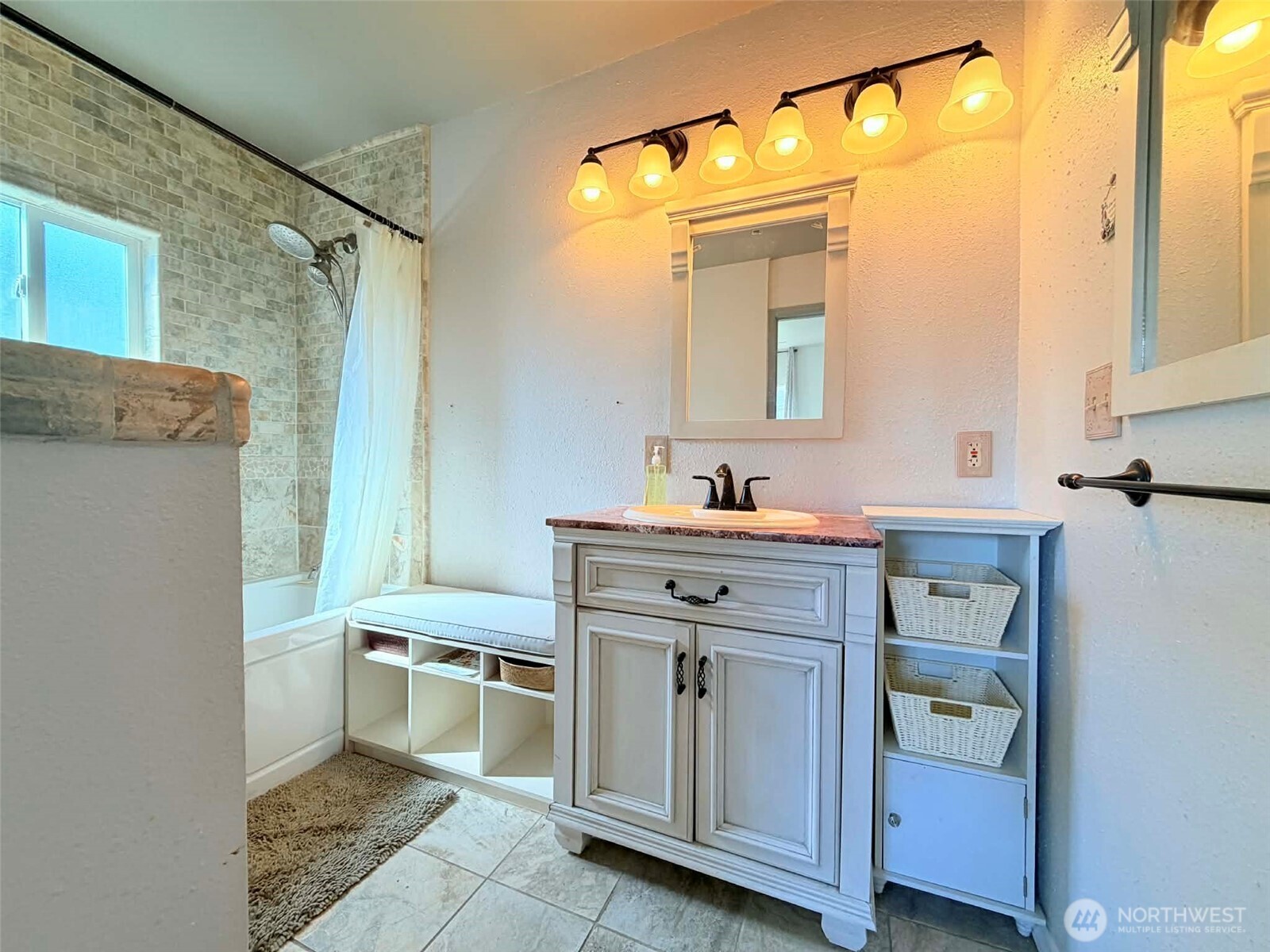 2006 West Second Street Aberdeen, WA 98520 - Photo 25 of 39 a bathroom with a sink and a mirror