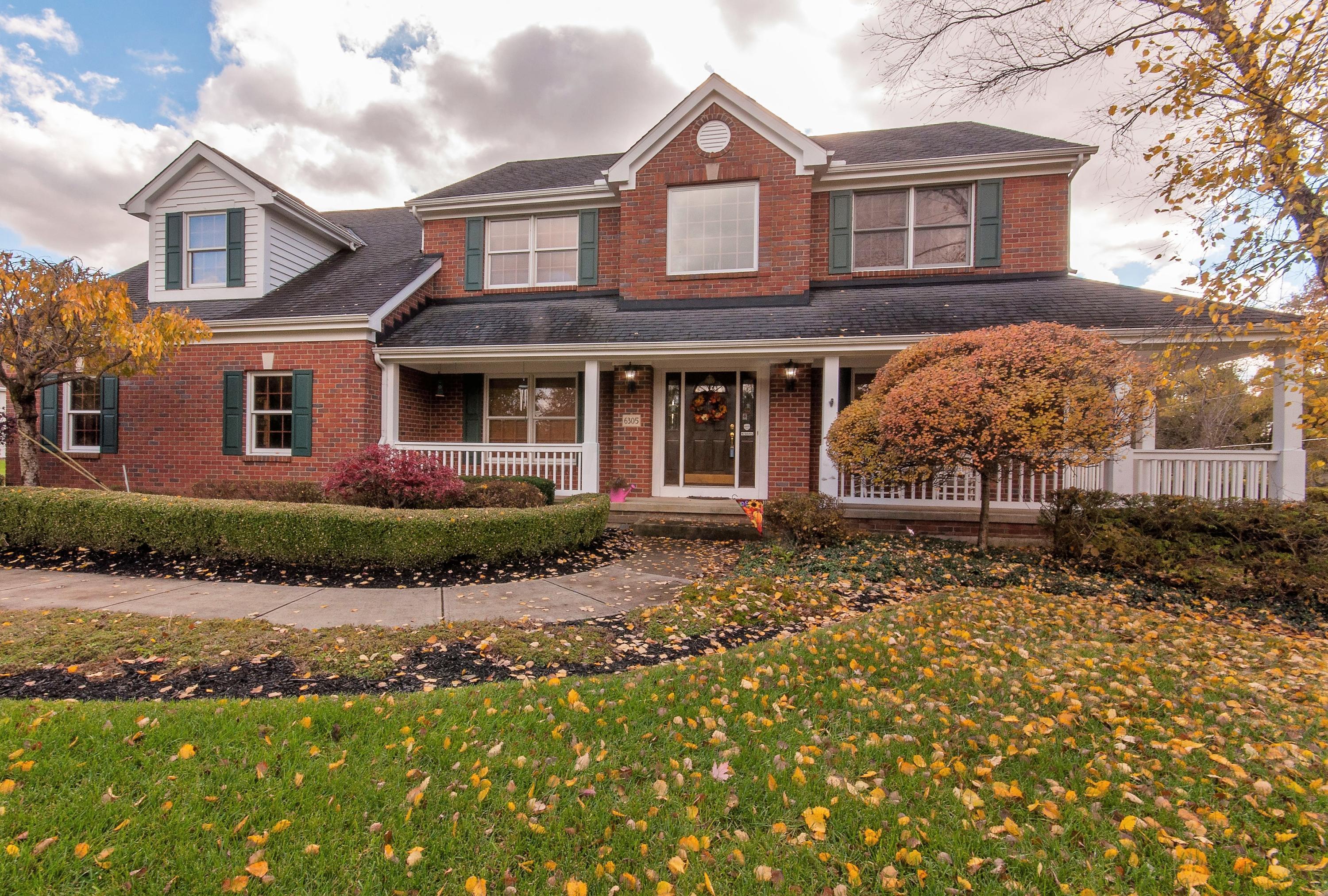 Stunning exterior with wrap around porch!