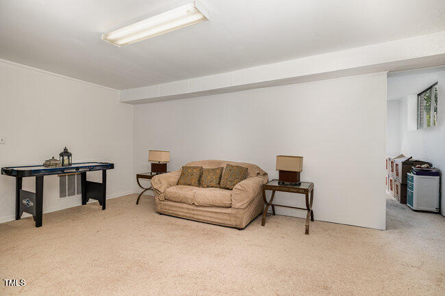 3610 Randolph Road Durham, NC 27705 - Photo 17 of 29 a living room with furniture and a window