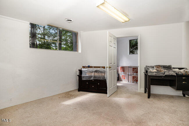 3610 Randolph Road Durham, NC 27705 - Photo 19 of 29 a living room with furniture and a flat screen tv