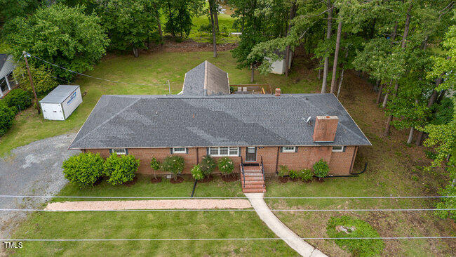 3610 Randolph Road Durham, NC 27705 - Photo 2 of 29 a view of a backyard with swimming pool and patio