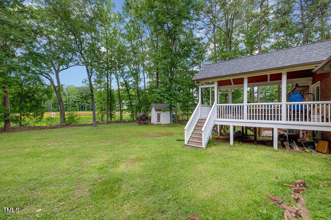 3610 Randolph Road Durham, NC 27705 - Photo 23 of 29 a view of a house with backyard porch and sitting area