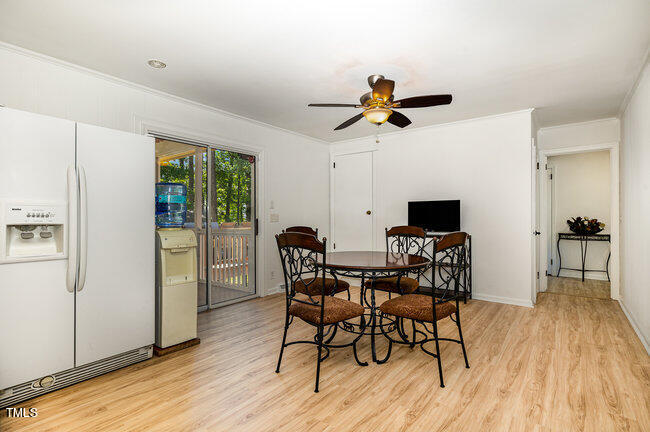 3610 Randolph Road Durham, NC 27705 - Photo 6 of 29 a view of a dining room with furniture and wooden floor