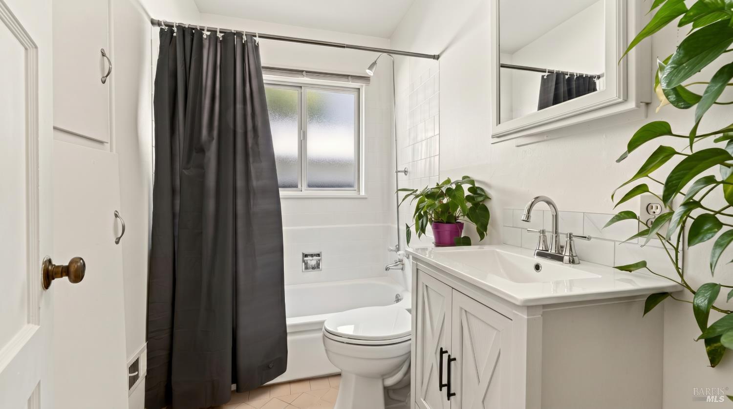 92 Oak Knoll Road Ukiah, CA 95482 - Photo 11 of 35 a bathroom with a sink a toilet and shower