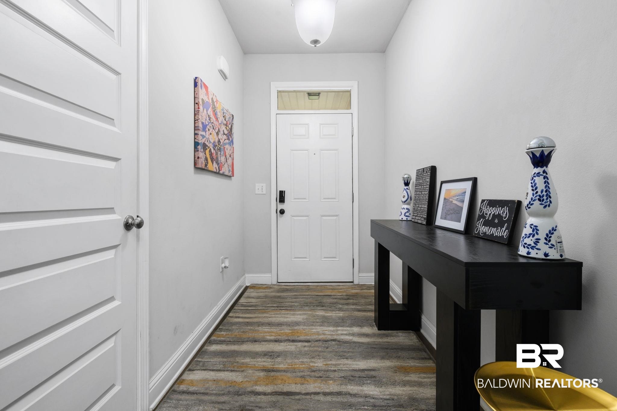 12693 Waxwing Avenue Daphne, AL 36527 - Photo 14 of 43 Foyer with baseboards and dark wood-style flooring