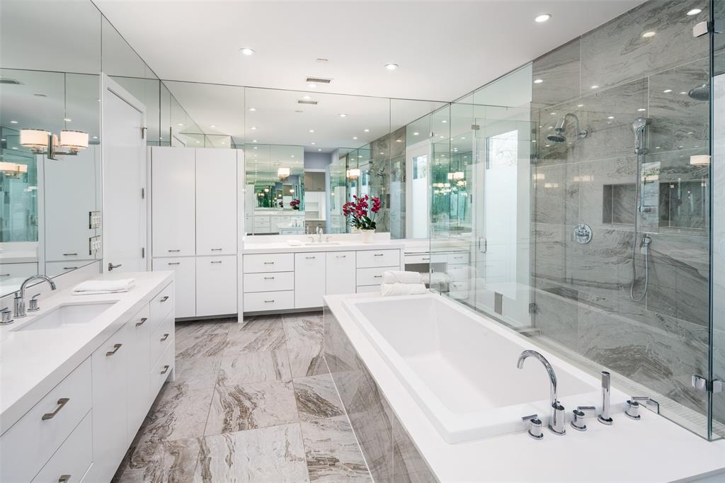 5811 Meletio Lane Dallas, TX 75230 - Photo 14 of 31 a large bathroom with a tub sink shower and mirror