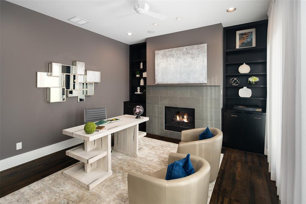 5811 Meletio Lane Dallas, TX 75230 - Photo 17 of 31 a living room with a couch and a fireplace