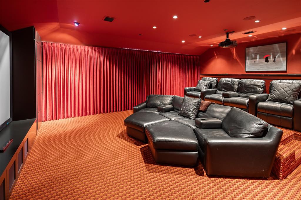 5811 Meletio Lane Dallas, TX 75230 - Photo 21 of 31 a projector room with a couch