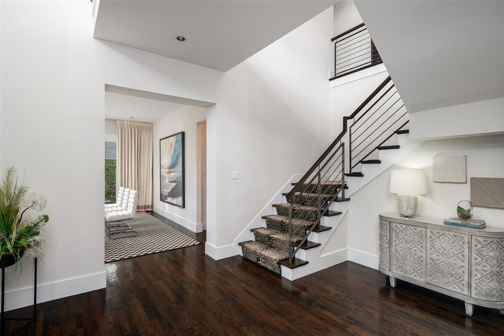 5811 Meletio Lane Dallas, TX 75230 - Photo 3 of 31 a view of entryway and hall with wooden floor