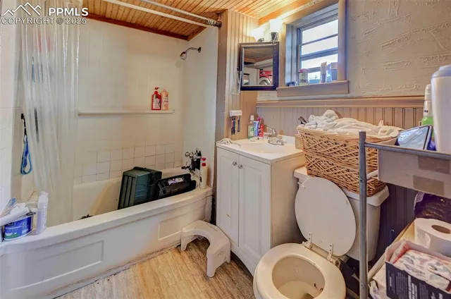 a bathroom with a sink a toilet and a bathtub