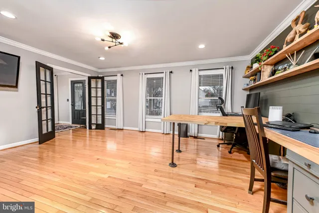 a kitchen with stainless steel appliances a refrigerator and a stove top oven