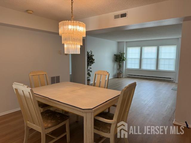 525 B Belford Road Monroe Township, NJ 08831 - Photo 2 of 8 a view of a dining room with furniture and window