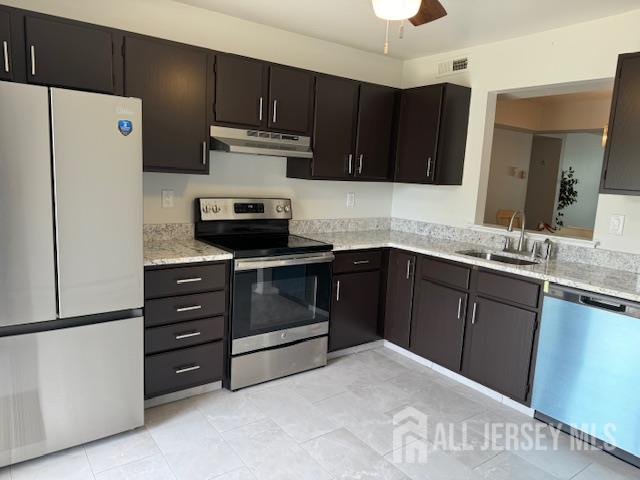 525 B Belford Road Monroe Township, NJ 08831 - Photo 4 of 8 a kitchen with stainless steel appliances granite countertop a refrigerator stove a sink and dishwasher