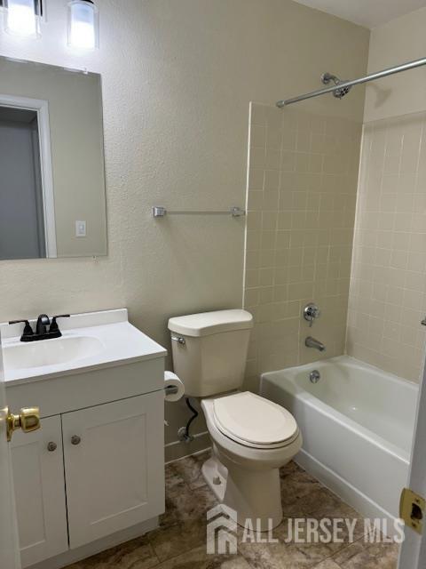525 B Belford Road Monroe Township, NJ 08831 - Photo 7 of 8 a bathroom with a toilet a sink and a shower