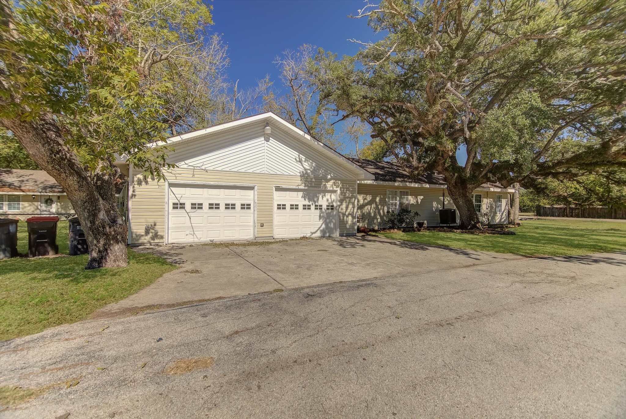 4123 Crosby Cedar Bayou Road Baytown, TX 77521 - Photo 4 of 26 a view of a house with a yard and garage