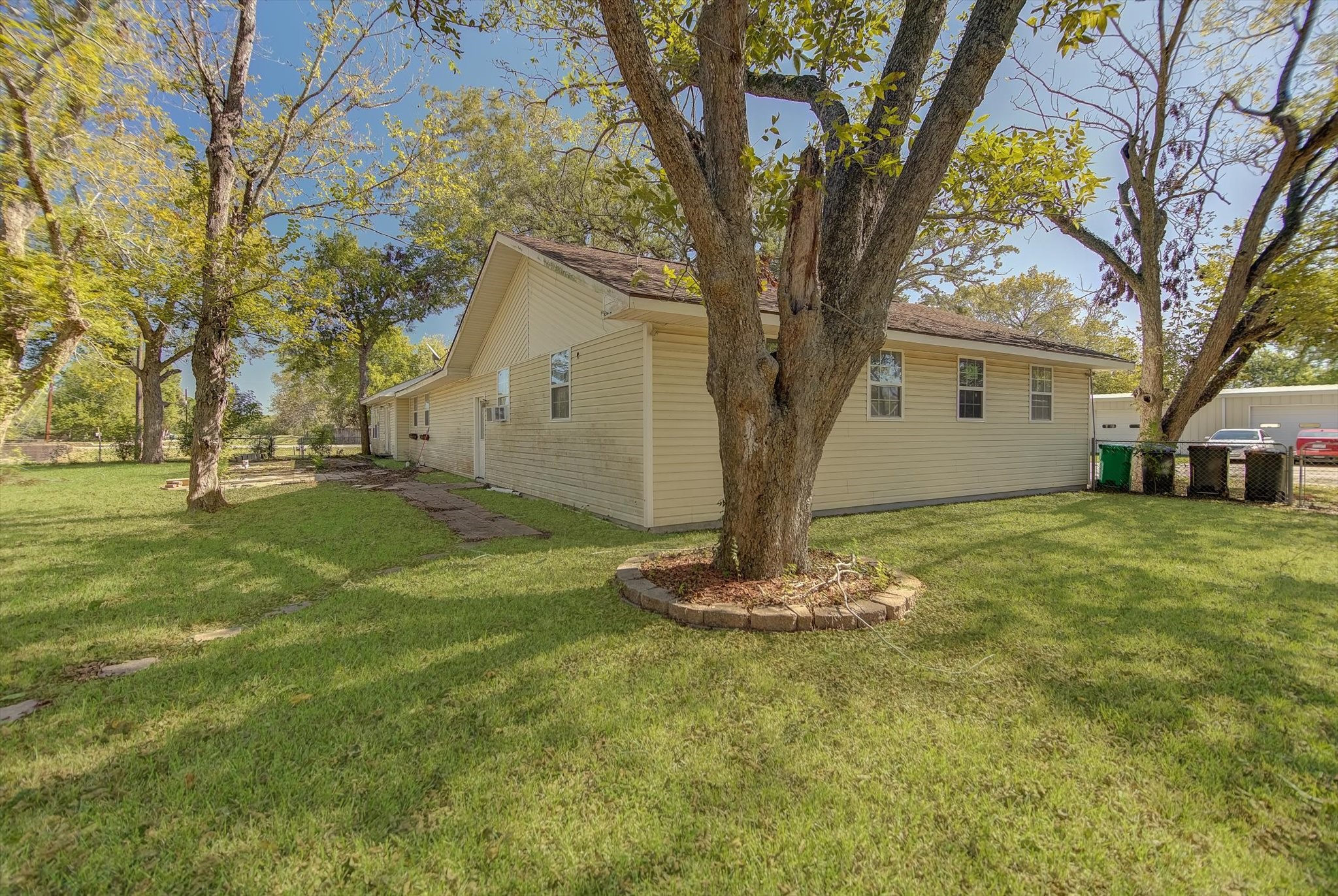 4123 Crosby Cedar Bayou Road Baytown, TX 77521 - Photo 7 of 26 a front view of house with a garden