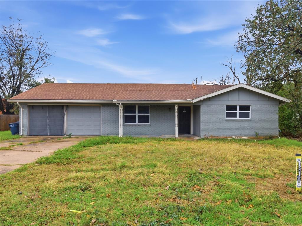 a house with yard in front of it