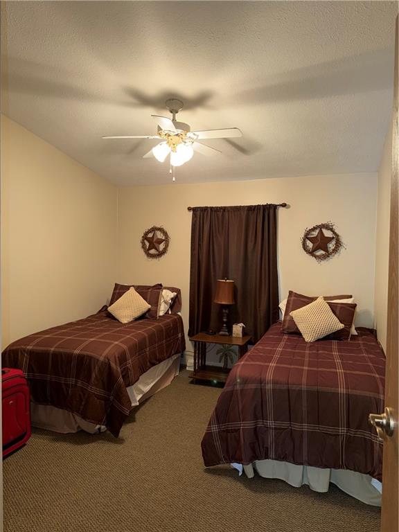 1881 Westford Road Jamestown, PA 16134 - Photo 35 of 50 a bedroom with a bed a ceiling fan and a dresser