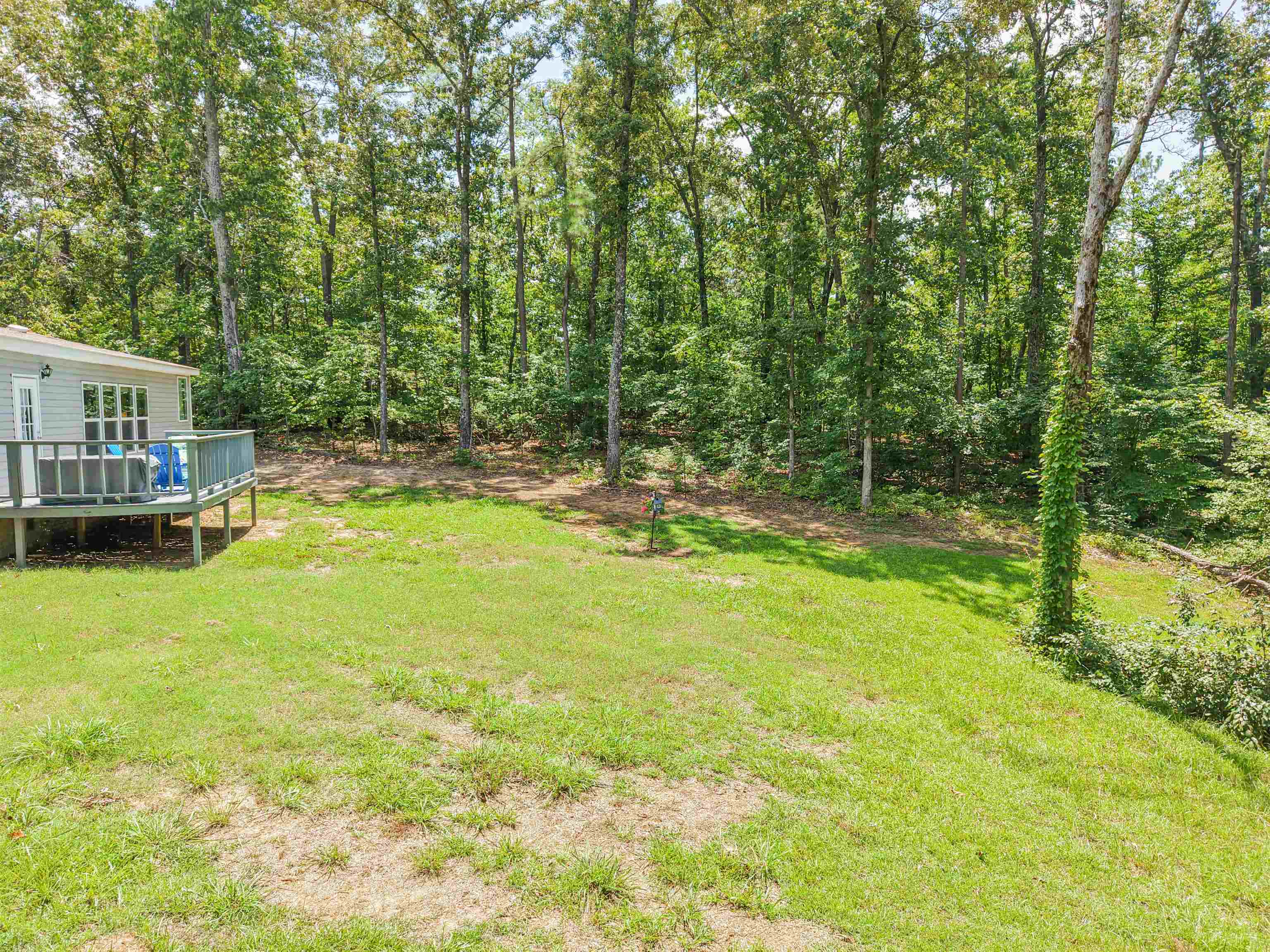 162 Matlock Road Ramer, TN 38367 - Photo 8 of 29 a view of a swimming pool with a patio
