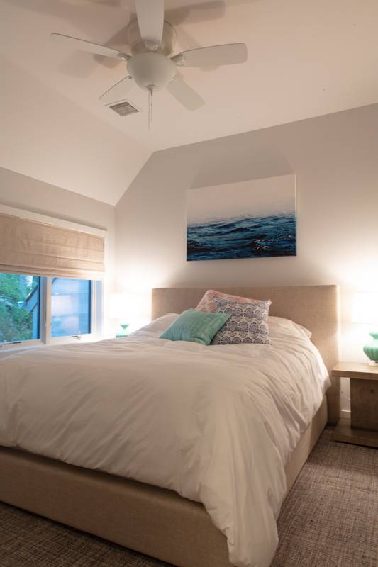 16 Roosevelt Road Montauk, NY 11954 - Photo 14 of 30 a bedroom with a bed and a night stand