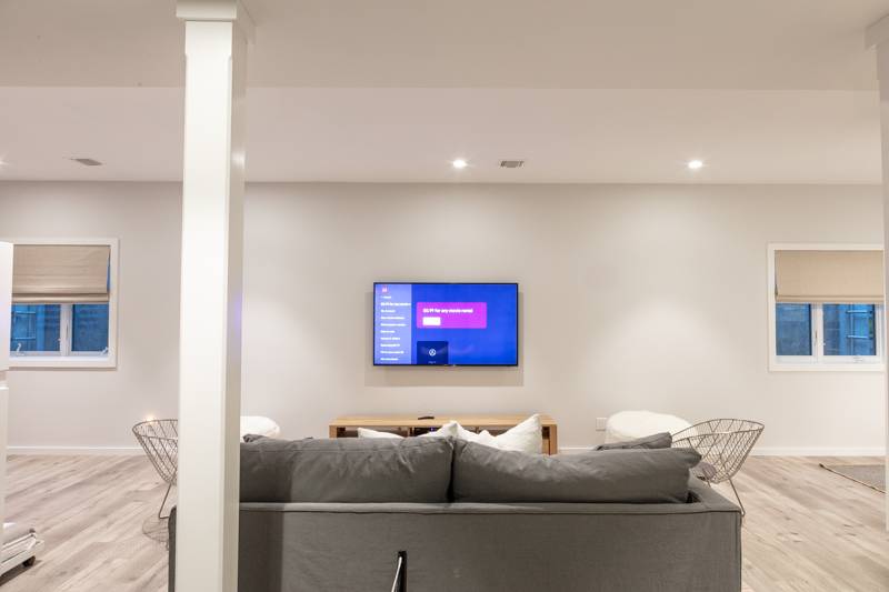 16 Roosevelt Road Montauk, NY 11954 - Photo 22 of 30 a living room with furniture and wall paintings