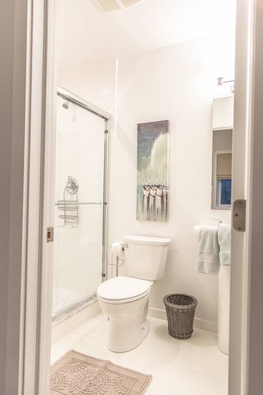 16 Roosevelt Road Montauk, NY 11954 - Photo 25 of 30 a bathroom with a toilet sink and shower