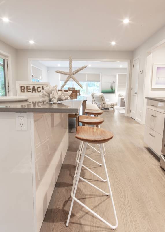 16 Roosevelt Road Montauk, NY 11954 - Photo 9 of 30 a living room with furniture and a wooden floor