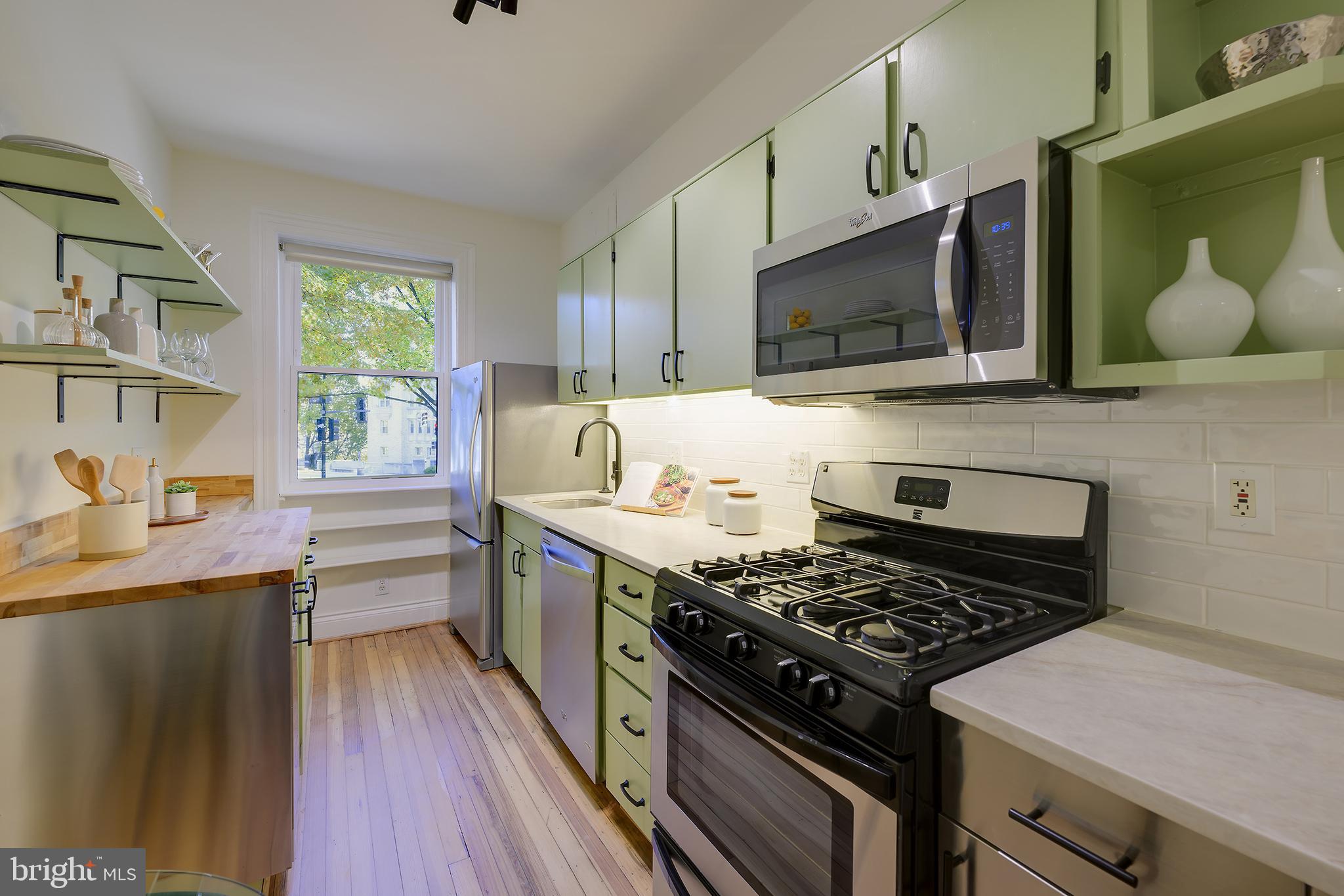 3100 Connecticut Avenue Northwest, Unit 145 Washington, DC 20008 - Photo 14 of 35 a kitchen with a stove and a sink
