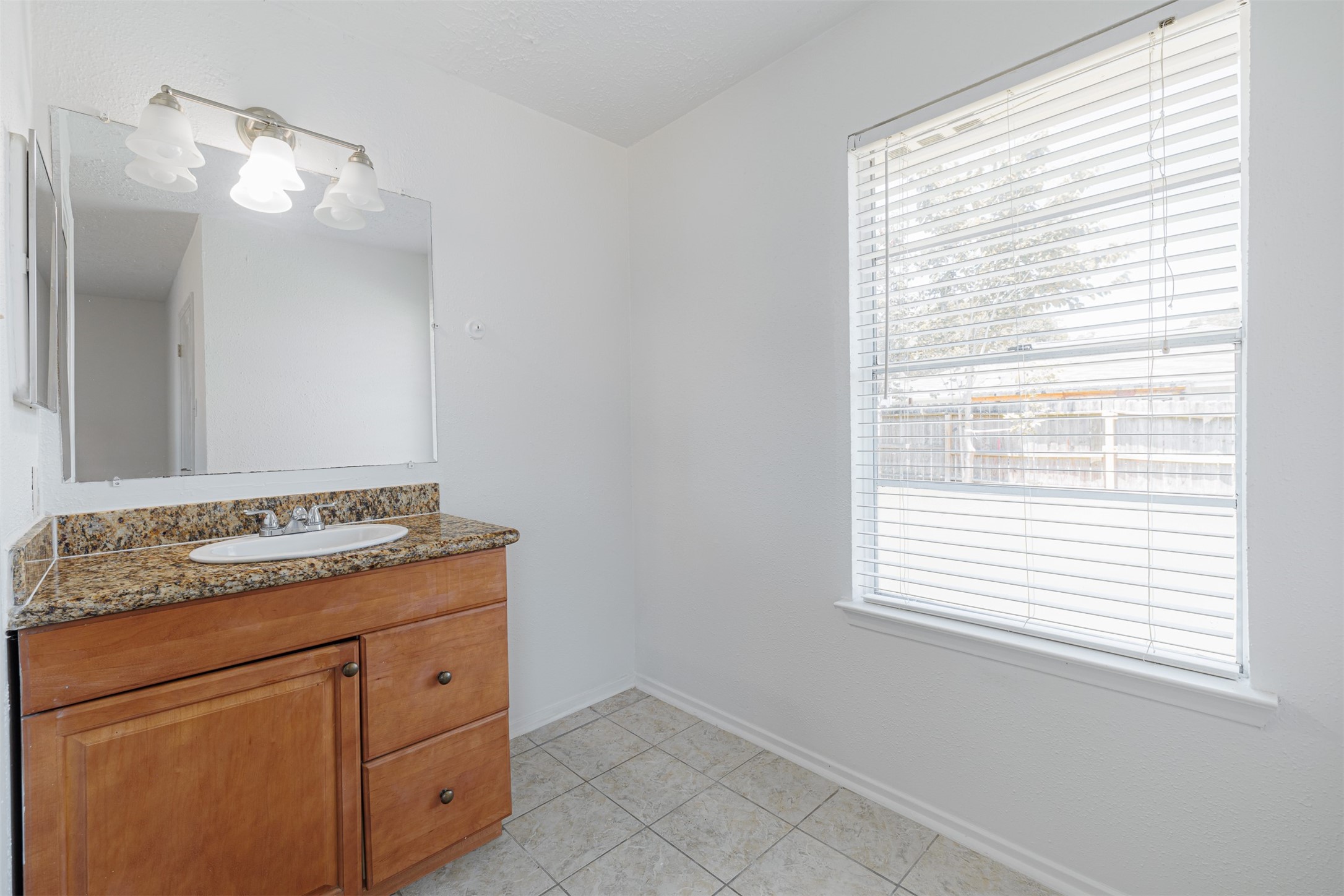16702 Pebbleglen Drive Houston, TX 77095 - Photo 14 of 17 a utility room with cabinets washer and dryer