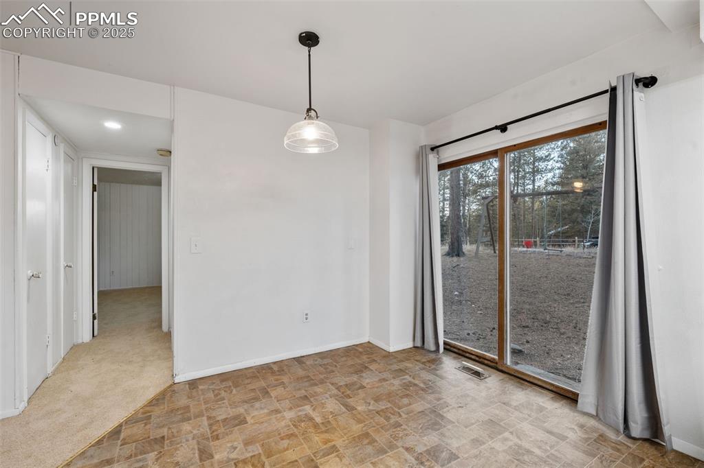 832 Spring Valley Drive Divide, CO 80814 - Photo 13 of 50 a view of an empty room and window