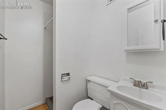 a bathroom with a toilet sink