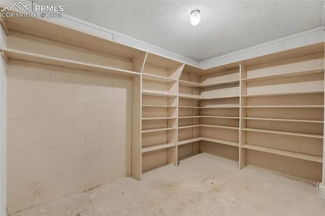 a view of an empty room with empty racks