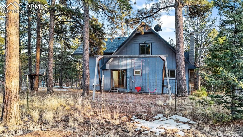 832 Spring Valley Drive Divide, CO 80814 - Photo 49 of 50 a view of a house with a yard