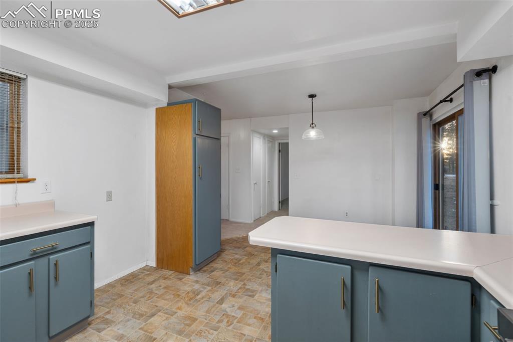 832 Spring Valley Drive Divide, CO 80814 - Photo 10 of 50 a bathroom with a sink a mirror and a shower