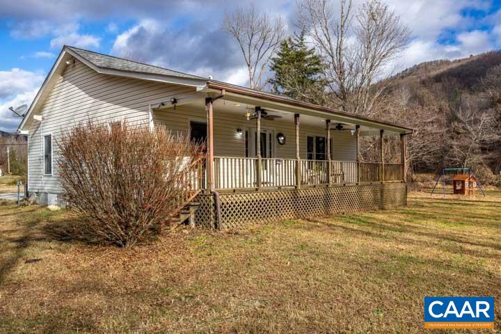 4657 Middle River Road Stanardsville, VA 22973 - Photo 2 of 40 a view of a house with a yard