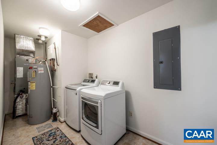 4657 Middle River Road Stanardsville, VA 22973 - Photo 33 of 40 a utility room with dryer and washer