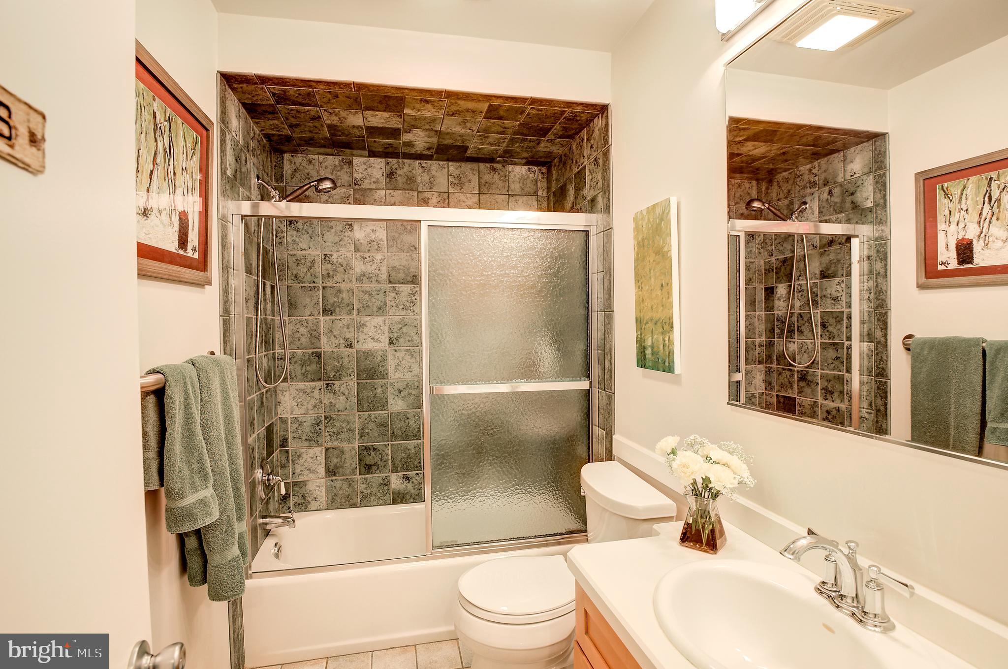 105 Franklin Road Glassboro, NJ 08028 - Photo 20 of 37 a bathroom with a sink a toilet and shower