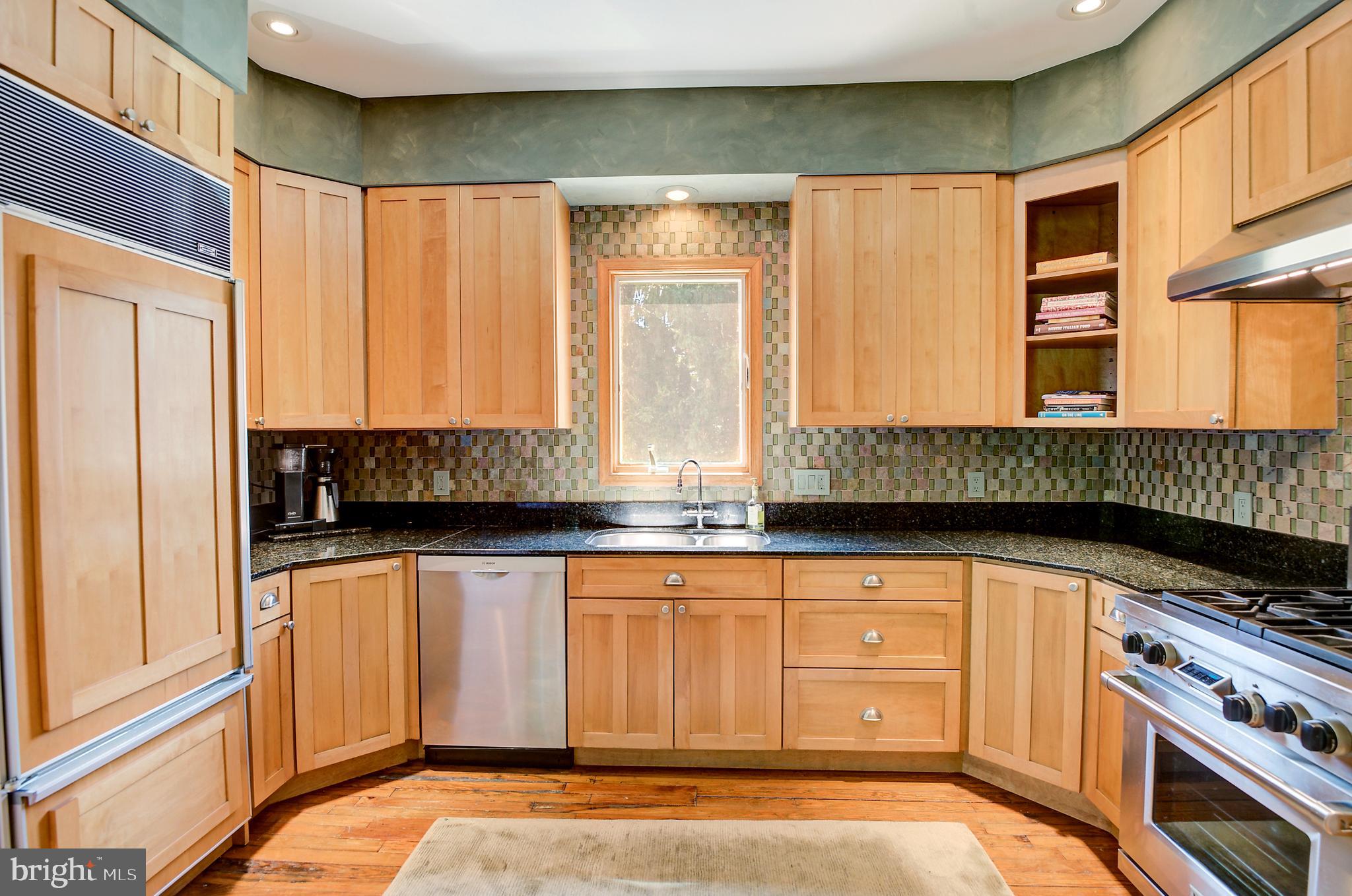 105 Franklin Road Glassboro, NJ 08028 - Photo 10 of 37 a kitchen with granite countertop a sink and a stove