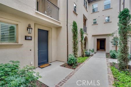 865 Orchid Way, Unit B Azusa, CA 91702 - Photo 2 of 12 front view of a house with potted plants