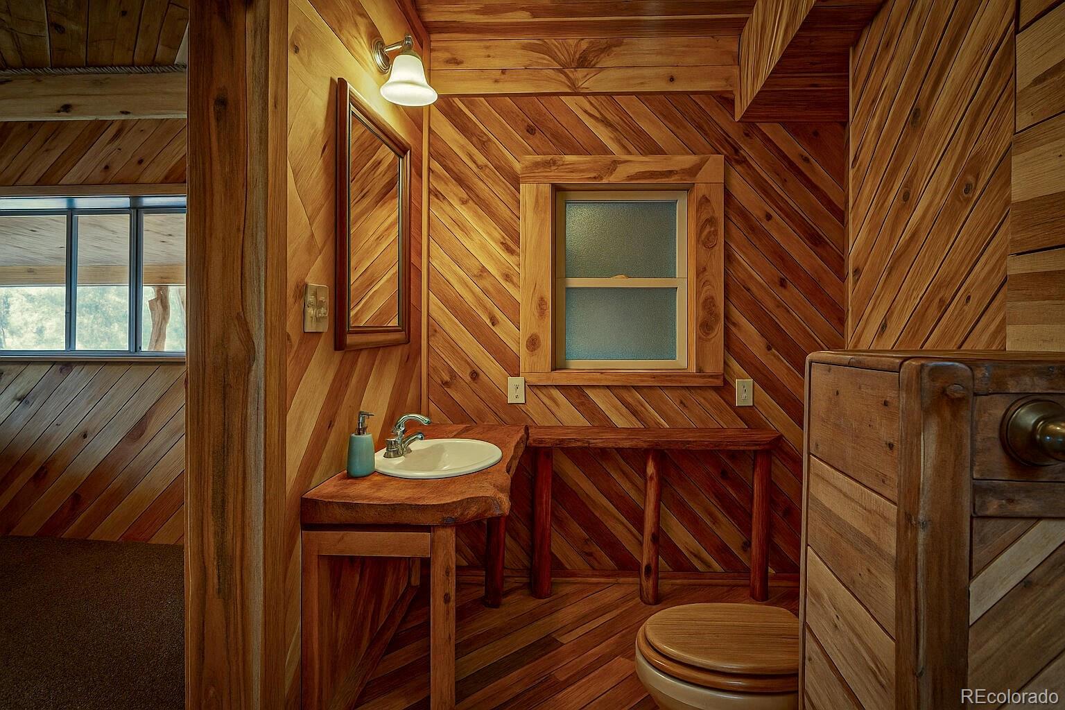 31300 Timber Canyon Road Trinidad, CO 81082 - Photo 17 of 50 a view of a balcony with chair and wooden fence