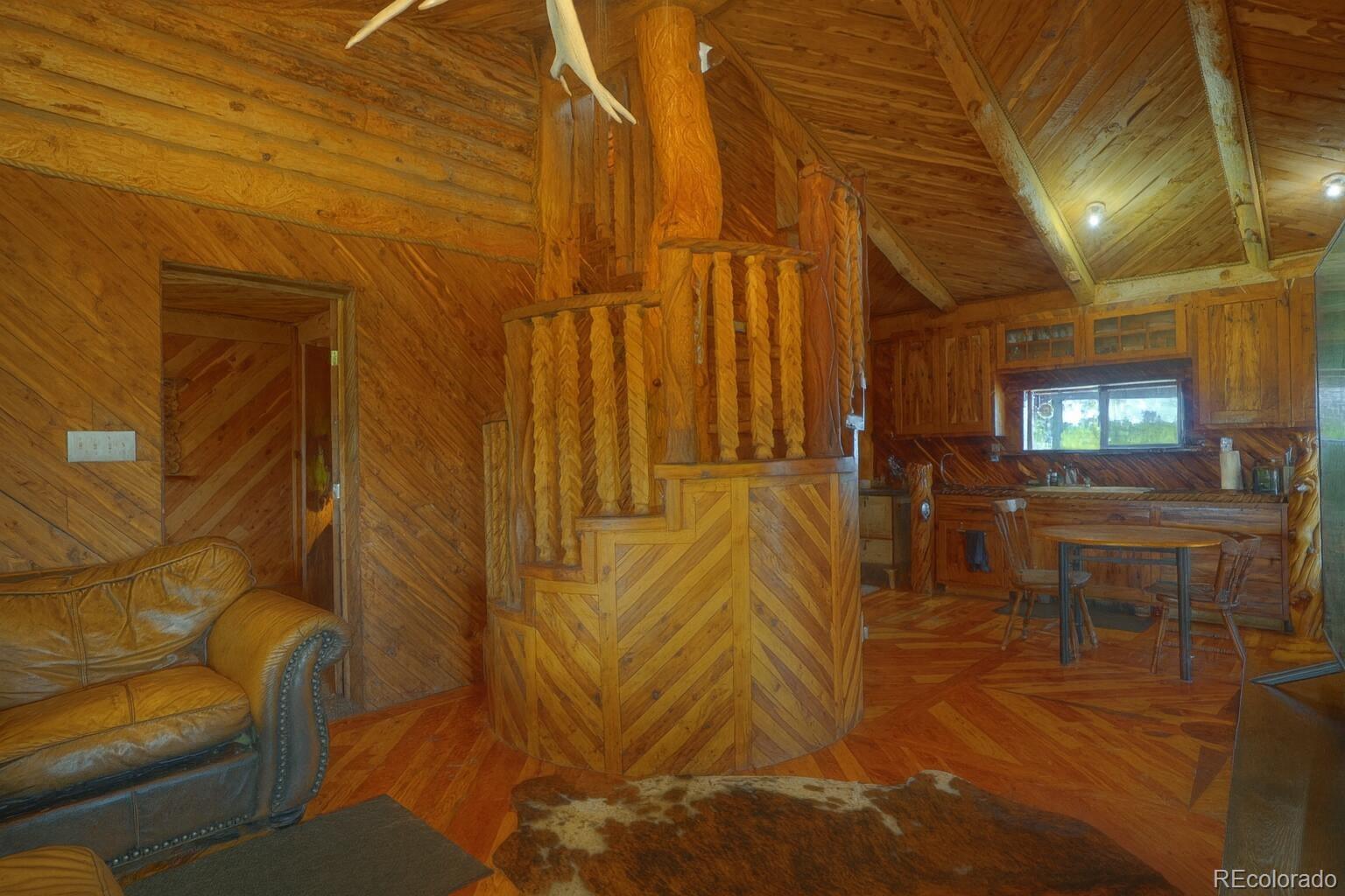 31300 Timber Canyon Road Trinidad, CO 81082 - Photo 21 of 50 a lobby with furniture and rug