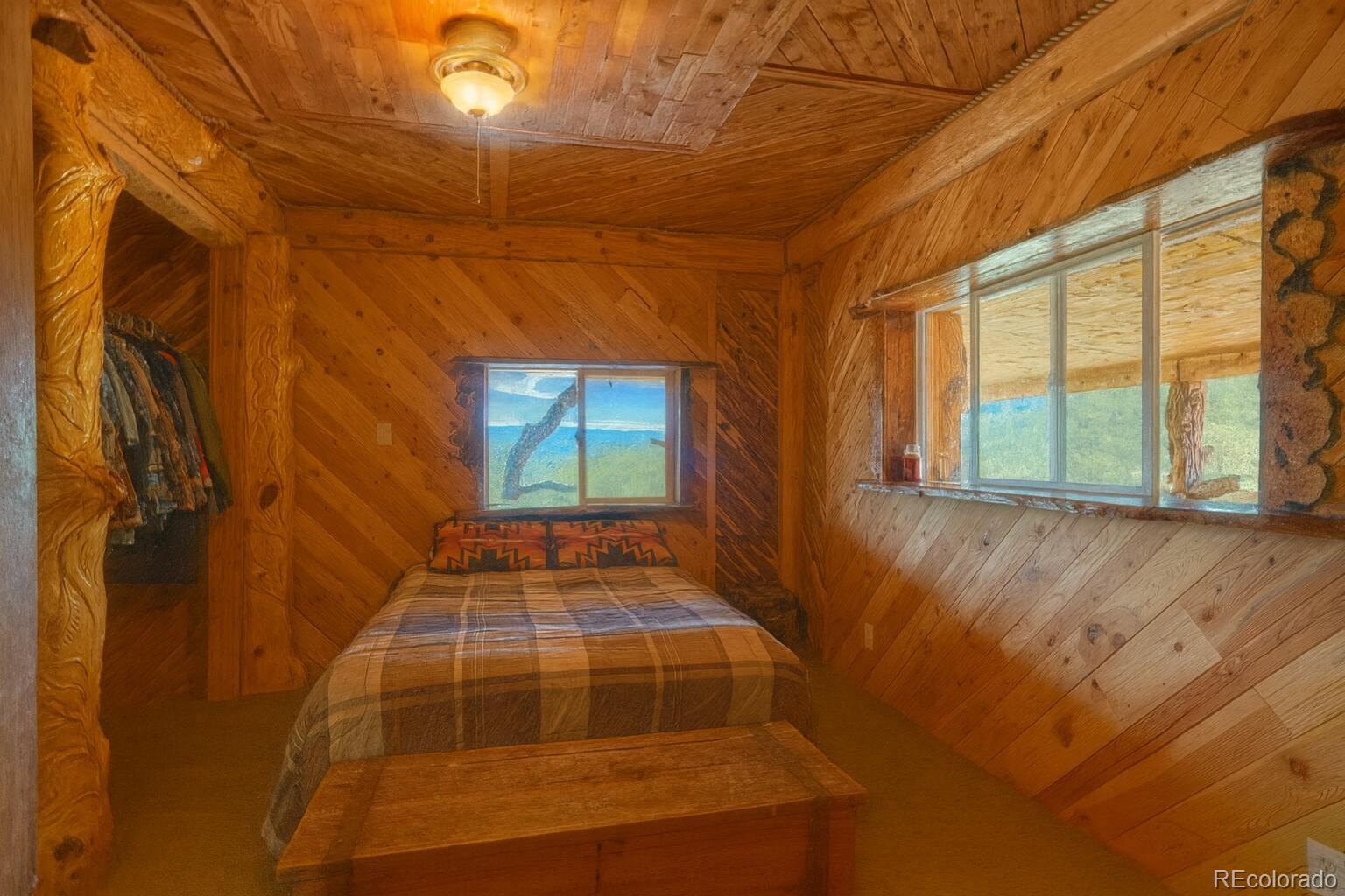 31300 Timber Canyon Road Trinidad, CO 81082 - Photo 23 of 50 a bedroom with a bed and a window