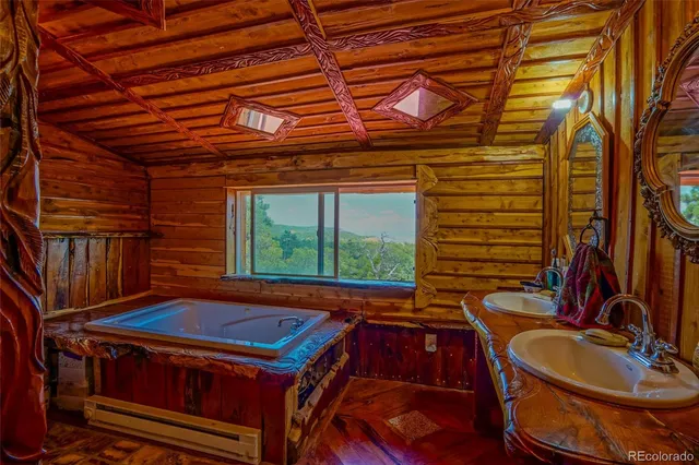 a bed sitting in a bedroom next to a blue building