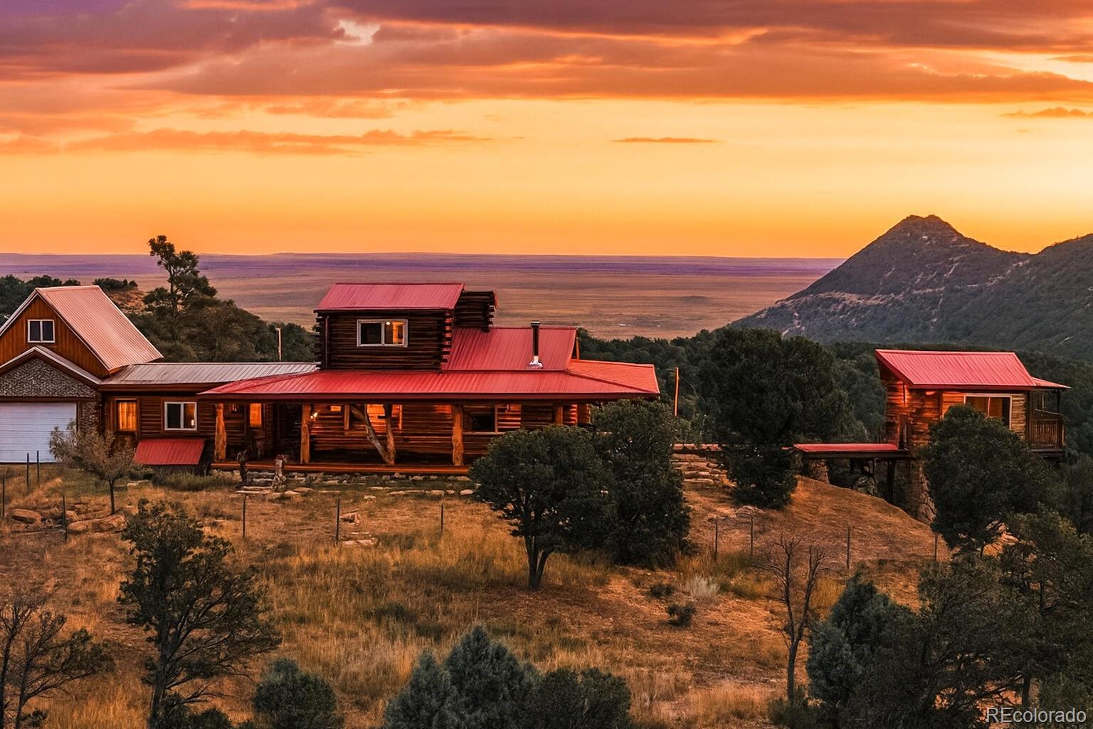 31300 Timber Canyon Road Trinidad, CO 81082 - Photo 3 of 50 a view of a cafe with a swimming pool and sitting area